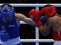 Carlos Sanchez (d) y Errol Spence 28 jul 12 EFE