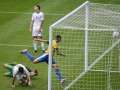 Leandro Damiao of Brazil scores a goal during their men's first round Group C preliminary soccer match against New Zealand at the London 2012 Olympic Games in Newcastle