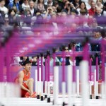 LONDRES. El atleta chino Xiang Liu se resiente del tobillo después de caer durante una de las mangas clasificatorias de los 110 metros valla masculino de la competición de Atletismo en los Juegos Olímpicos de Londres 2012. Foto: EFE