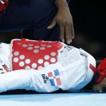 LONDRES. El dominicano Yulis Mercedes durante su combate contra el yemení Mohammed Ahmed Al-Kubati en la competición -58 kilos del torneo taekwondo de los Juegos Olímpicos de Londres 2012. Foto: EFE