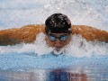 Michael Phelps of the U.S. swims to win gold in the men's 100m butterfly final during the London 2012 Olympic Games at the Aquatics Centre